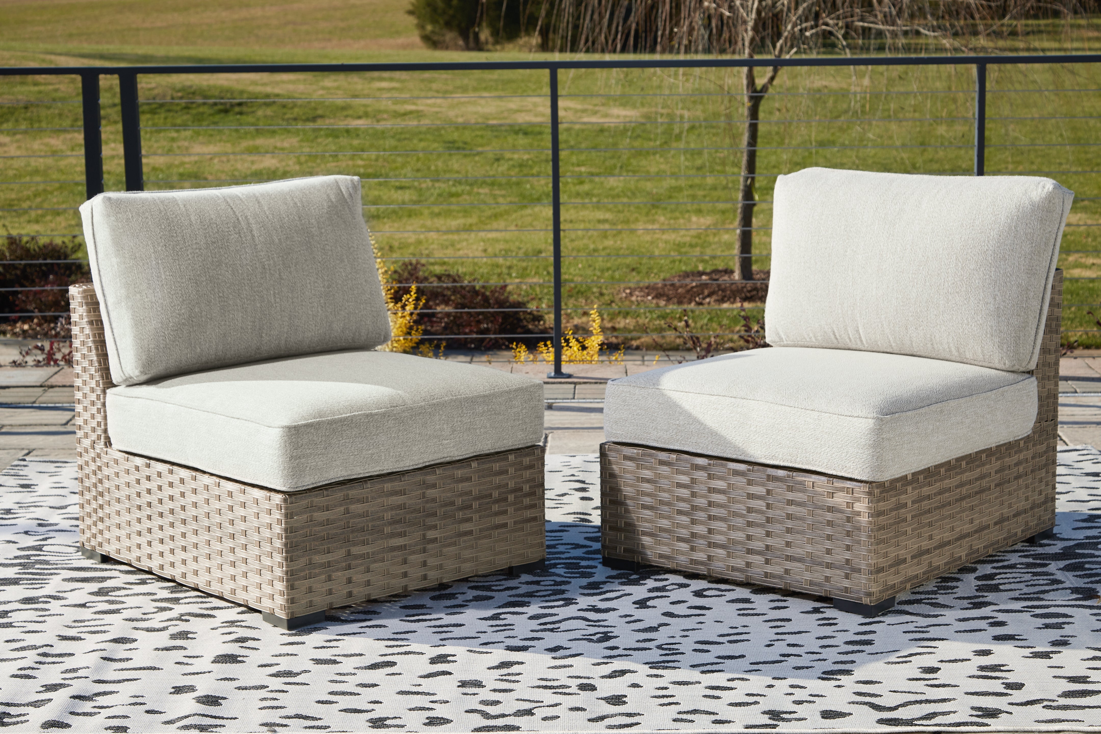 Furniture City Laplace - Ashley Furniture - Calworth Outdoor Armless Chair with Cushion (Set of 2) - Armless Chair w/Cushion (Set of 2) - P458-846