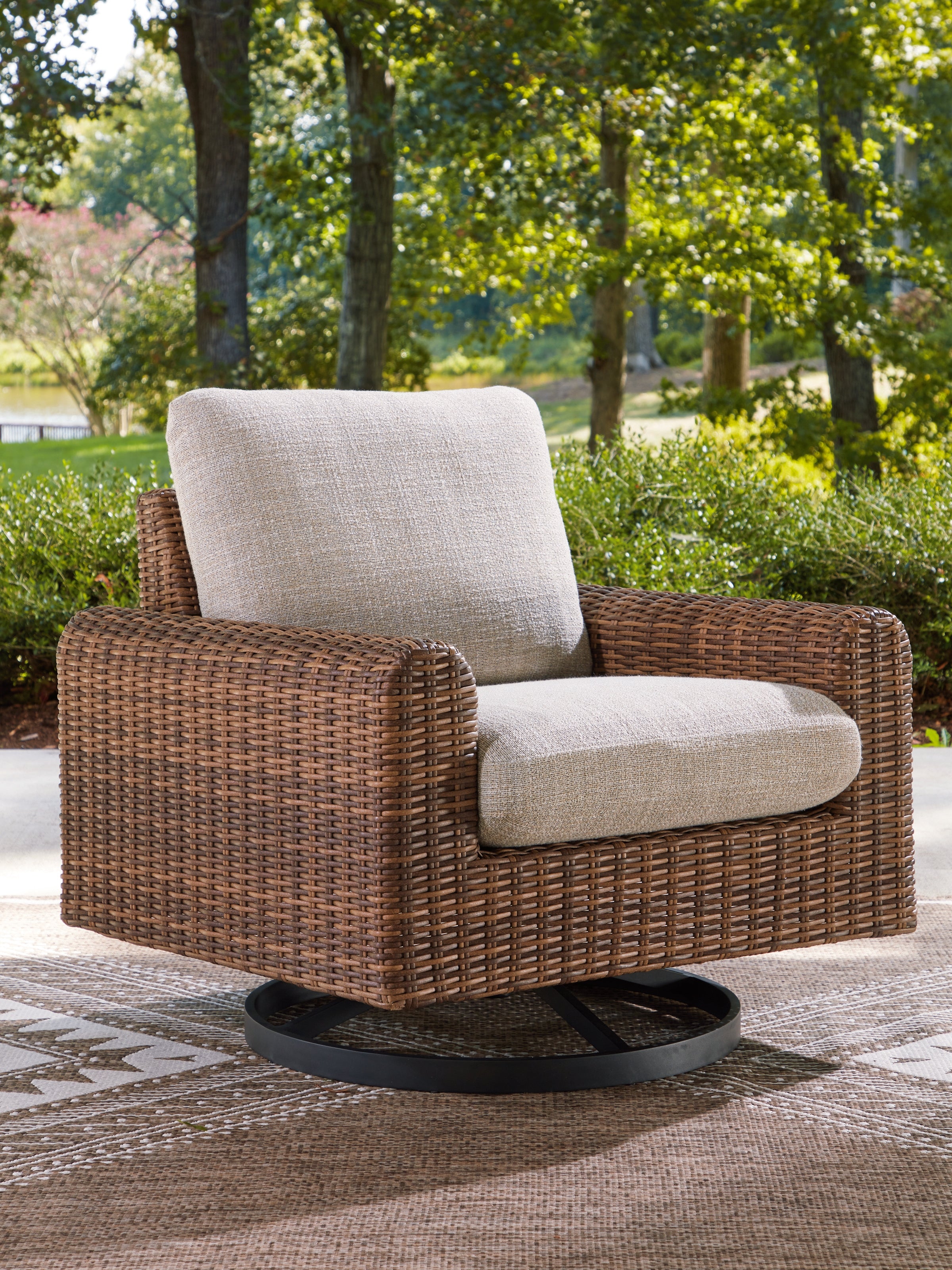 Furniture City Laplace - Ashley Furniture - Dolan Creek Outdoor Swivel Lounge Chair with Cushion - Swivel Lounge w/ Cushion - PCP610-821