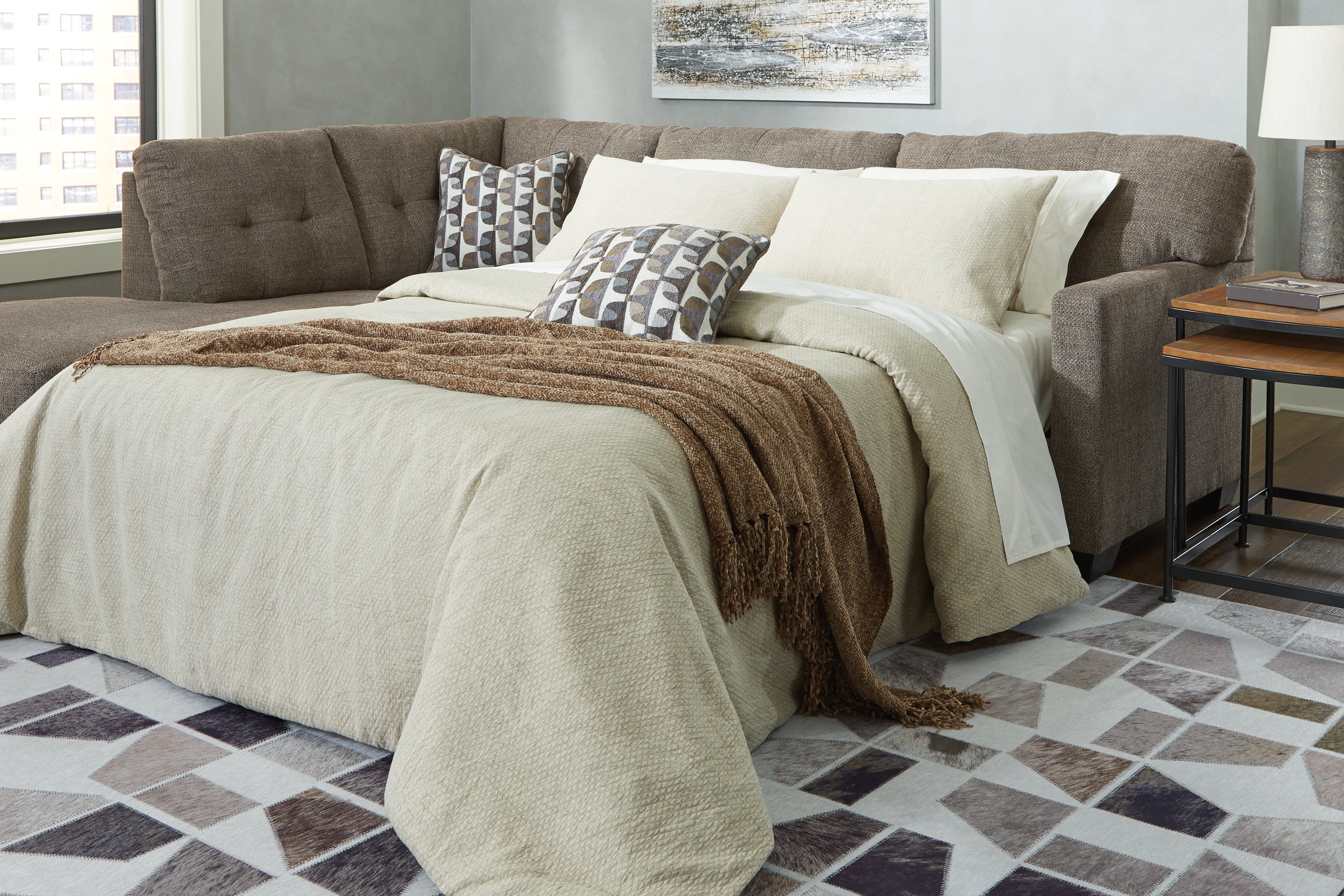 Furniture City Laplace - Ashley Furniture - Mahoney Sectionals - RAF 2-Piece Sleeper Sectional with Chaise / Chocolate - 31005S3