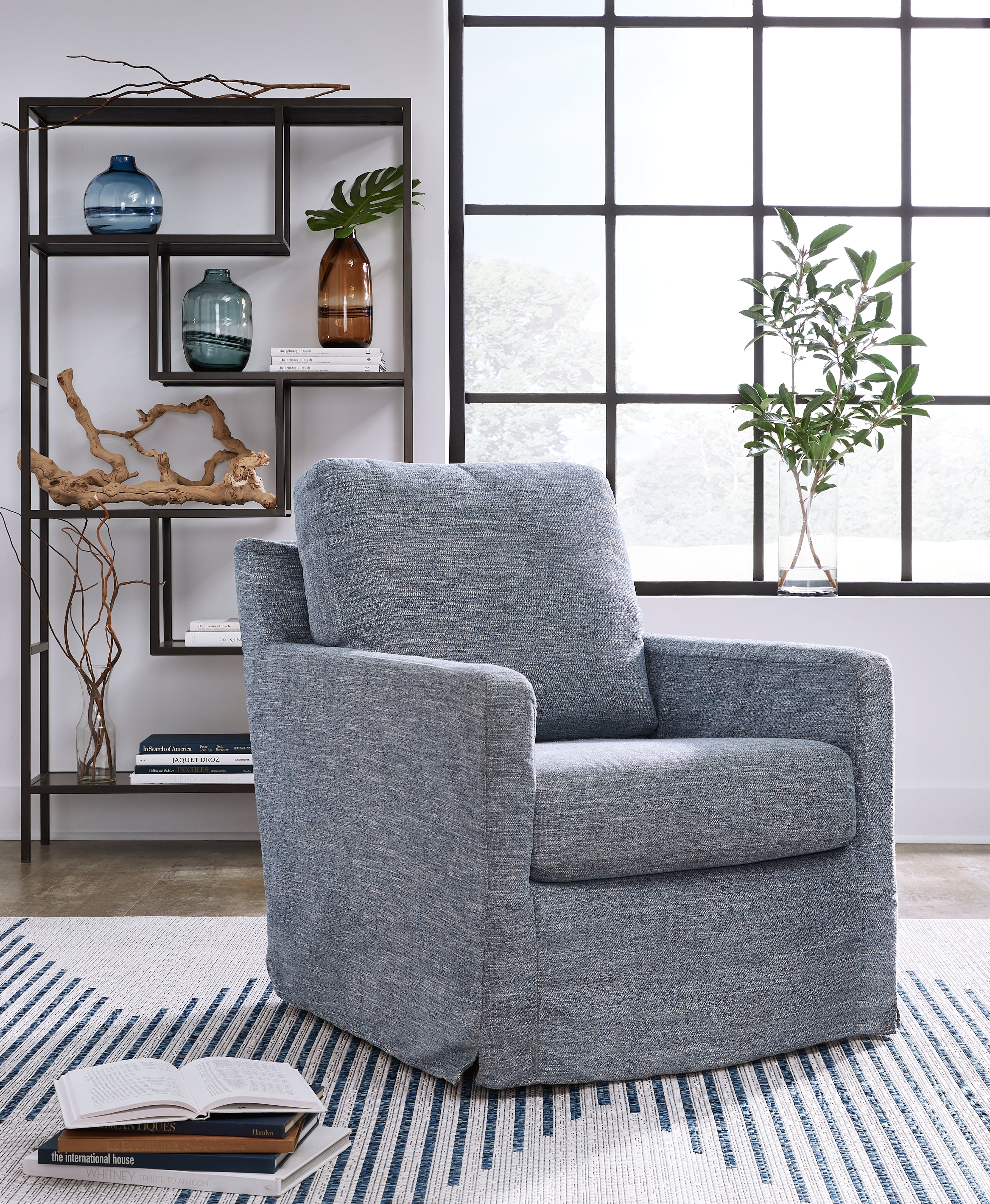 Furniture City Laplace - Ashley Furniture - Nenana Next-Gen Nuvella Swivel Glider Accent Chair - Swivel Glider Accent Chair / Denim - A3000646