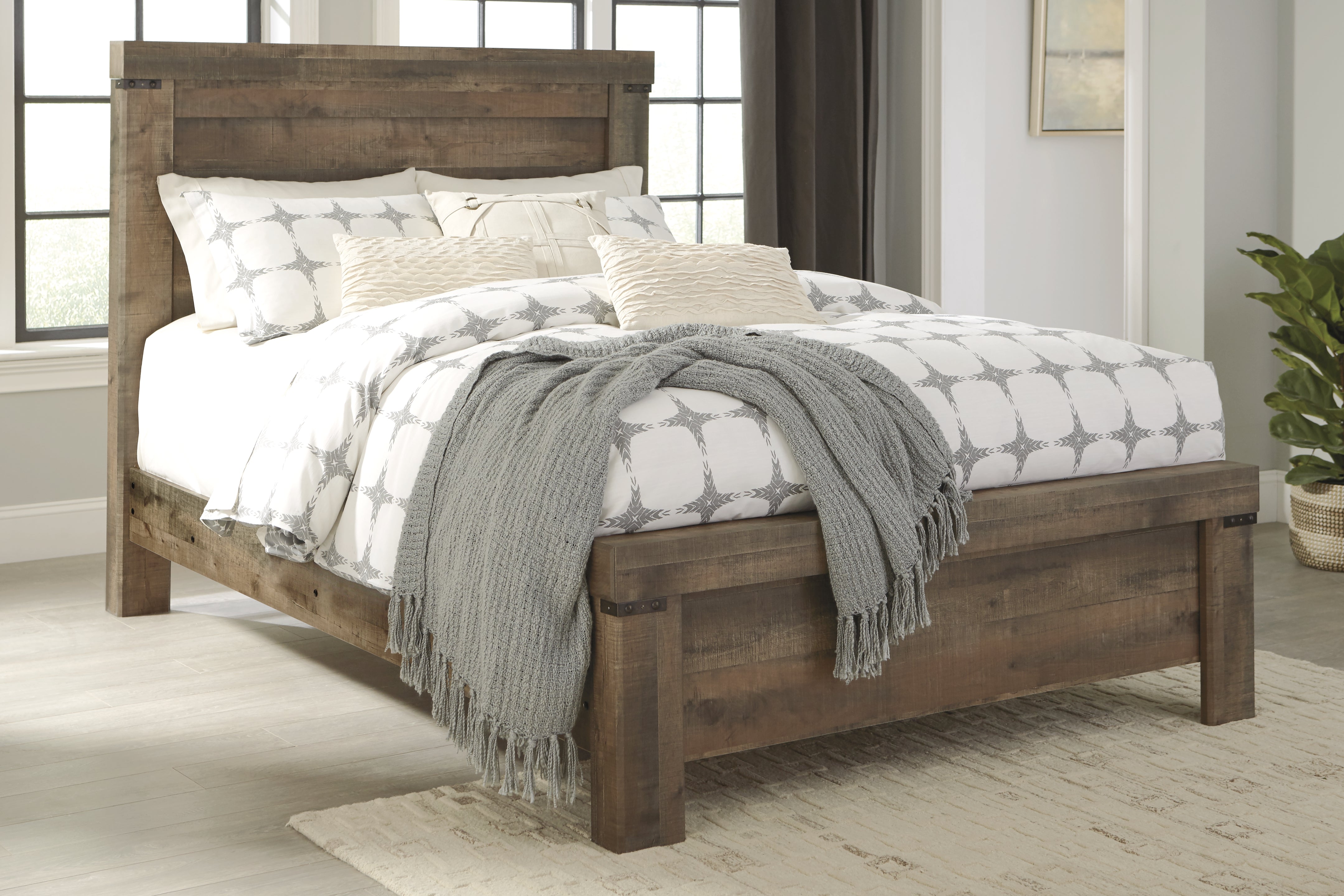 Furniture City Laplace - Ashley Furniture - Trinell Bedroom - Queen Panel Bed / Brown - B446B48