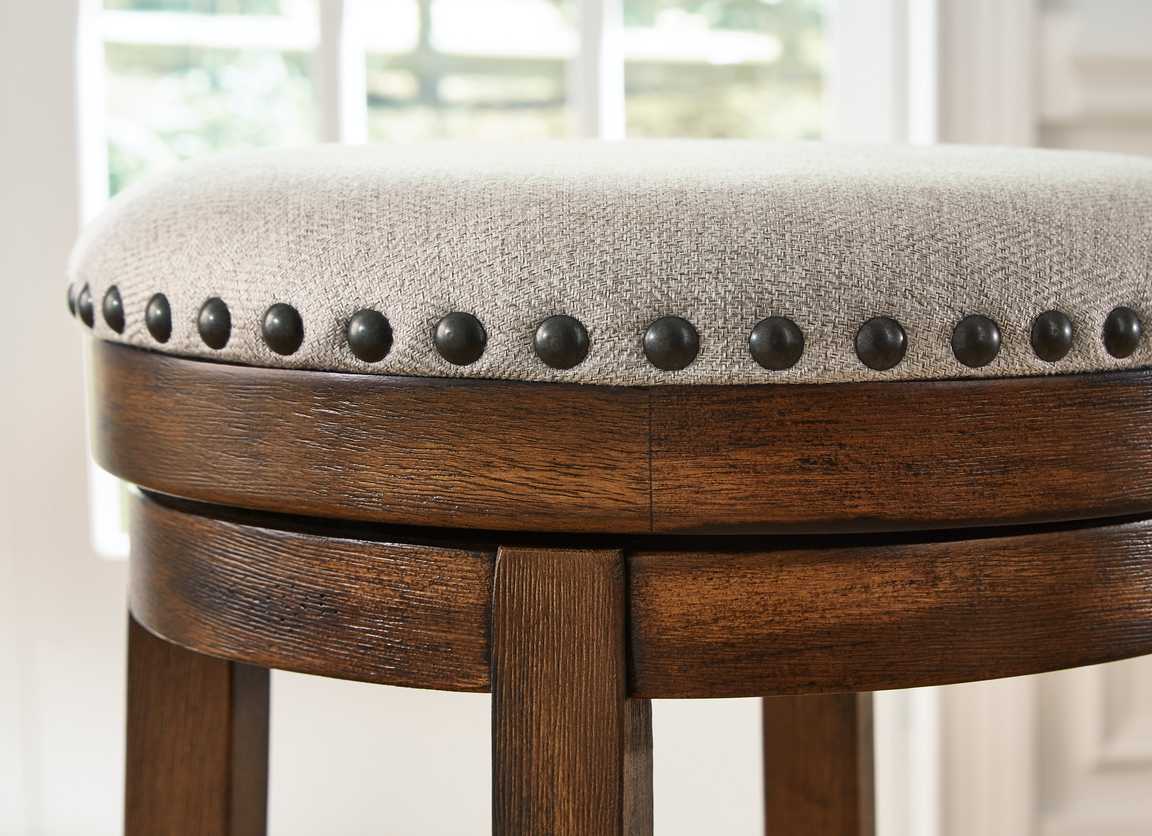 Furniture City Laplace - Ashley Furniture - Valebeck Dining Room - UPH Swivel Stool (1/CN) / Brown/Black - D546-124