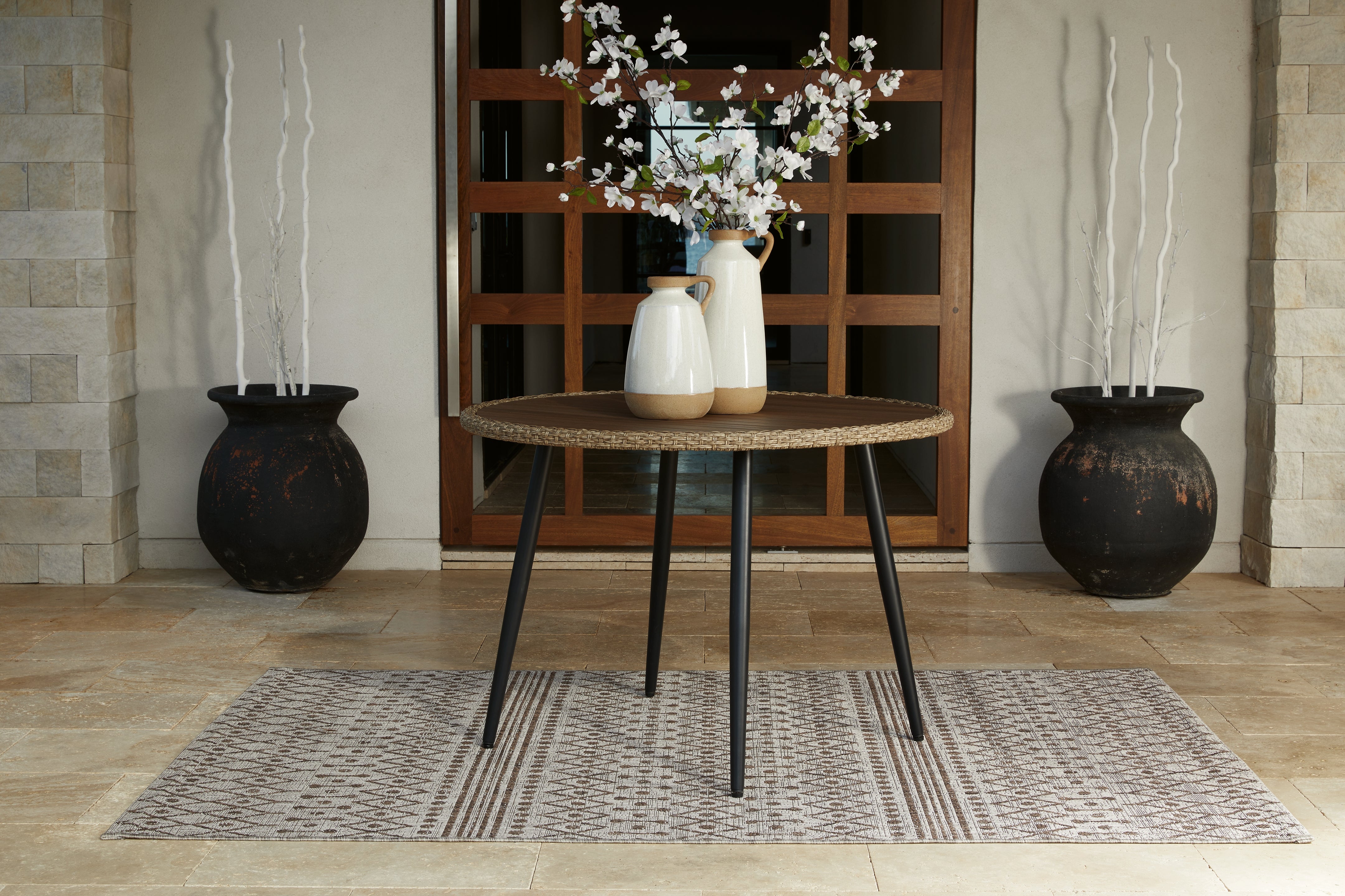 Furniture City Laplace - Ashley Furniture - Amaris Outdoor - Round Dining Table / Brown/Black - P369-615