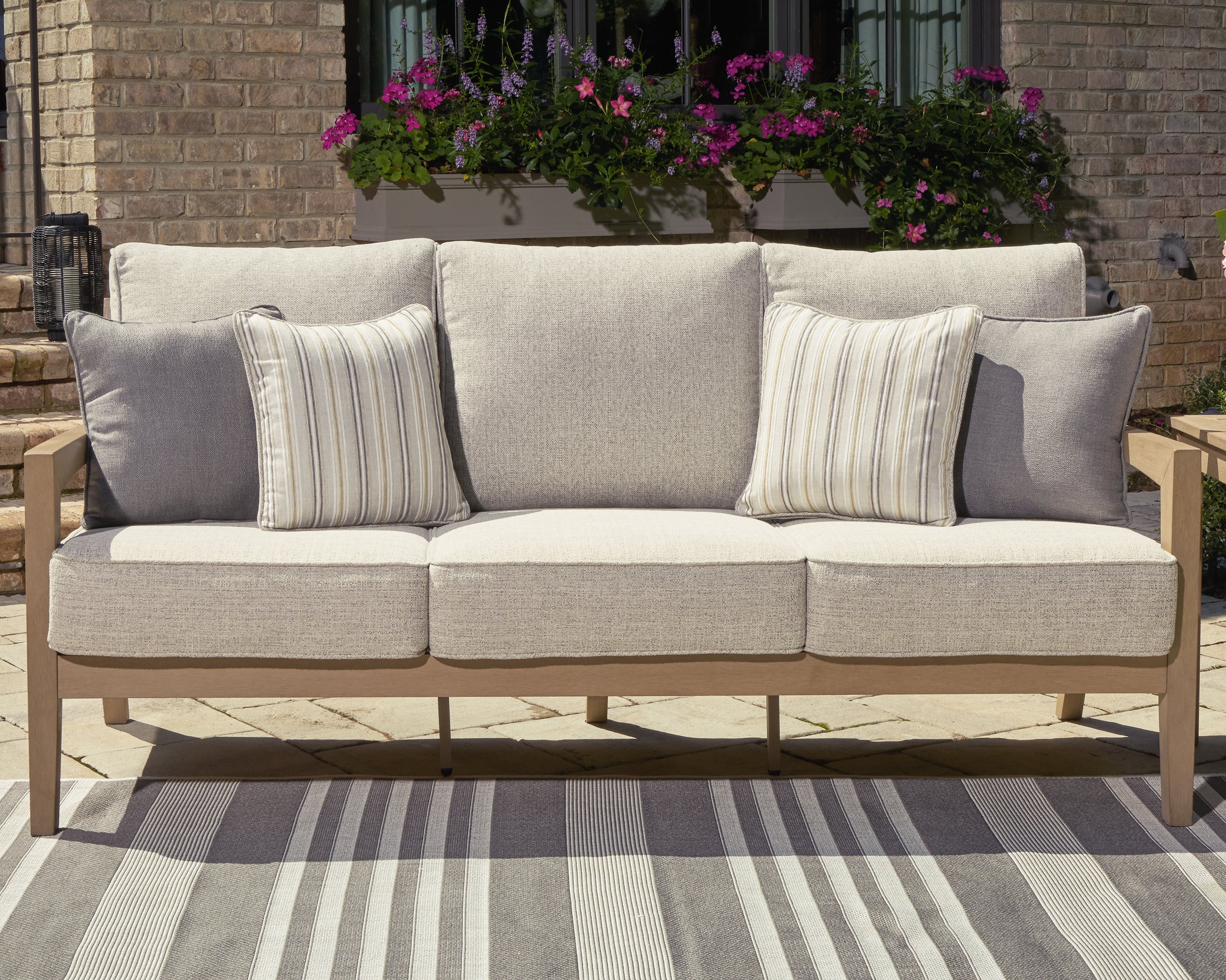 Furniture City Laplace - Ashley Furniture - Hallow Creek Outdoor - Sofa with Cushion - P560-838