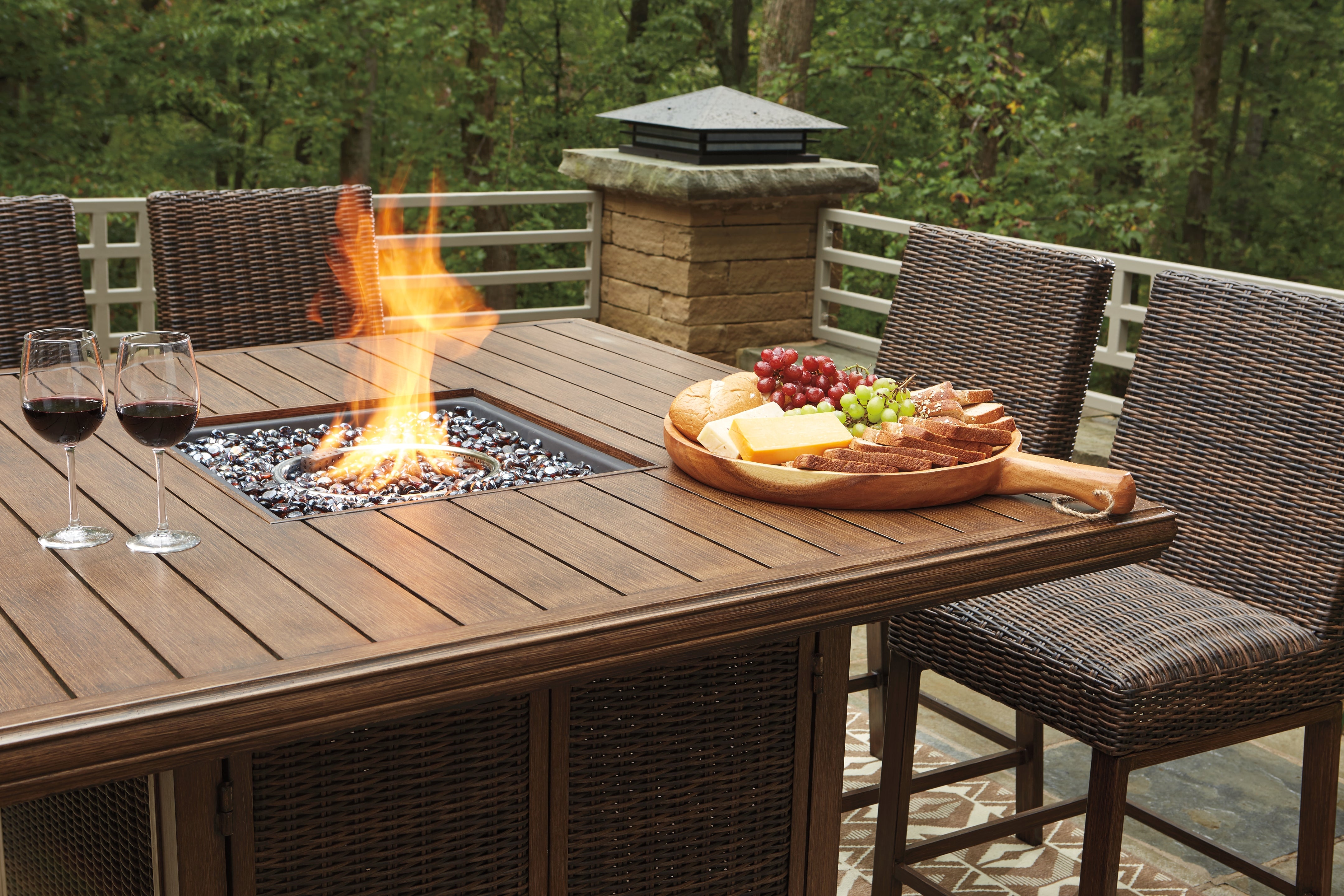 Furniture City Laplace - Ashley Furniture - Paradise Trail Outdoor - Outdoor Counter Height Dining Table with 4 Barstools / Medium Brown - P750P5