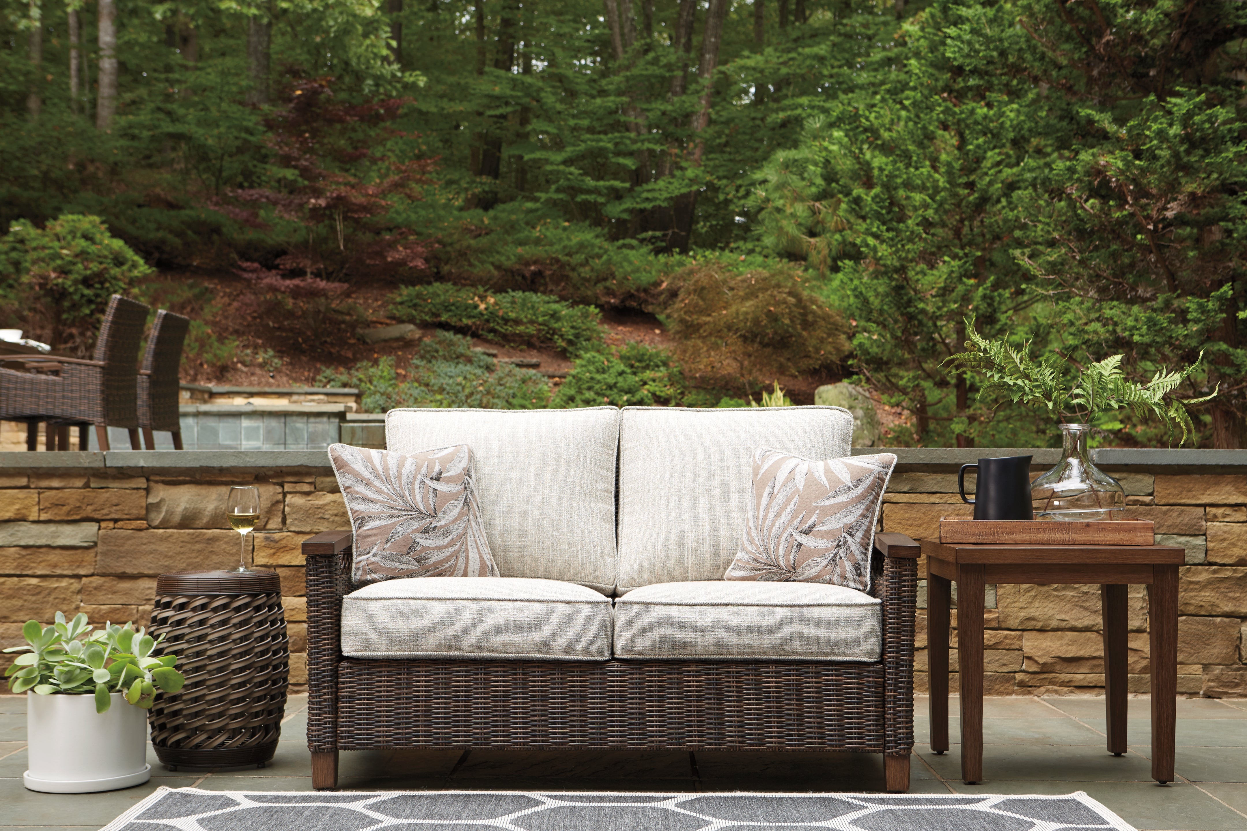 Furniture City Laplace - Ashley Furniture - Paradise Trail Outdoor - Loveseat w/Cushion / Medium Brown - P750-835