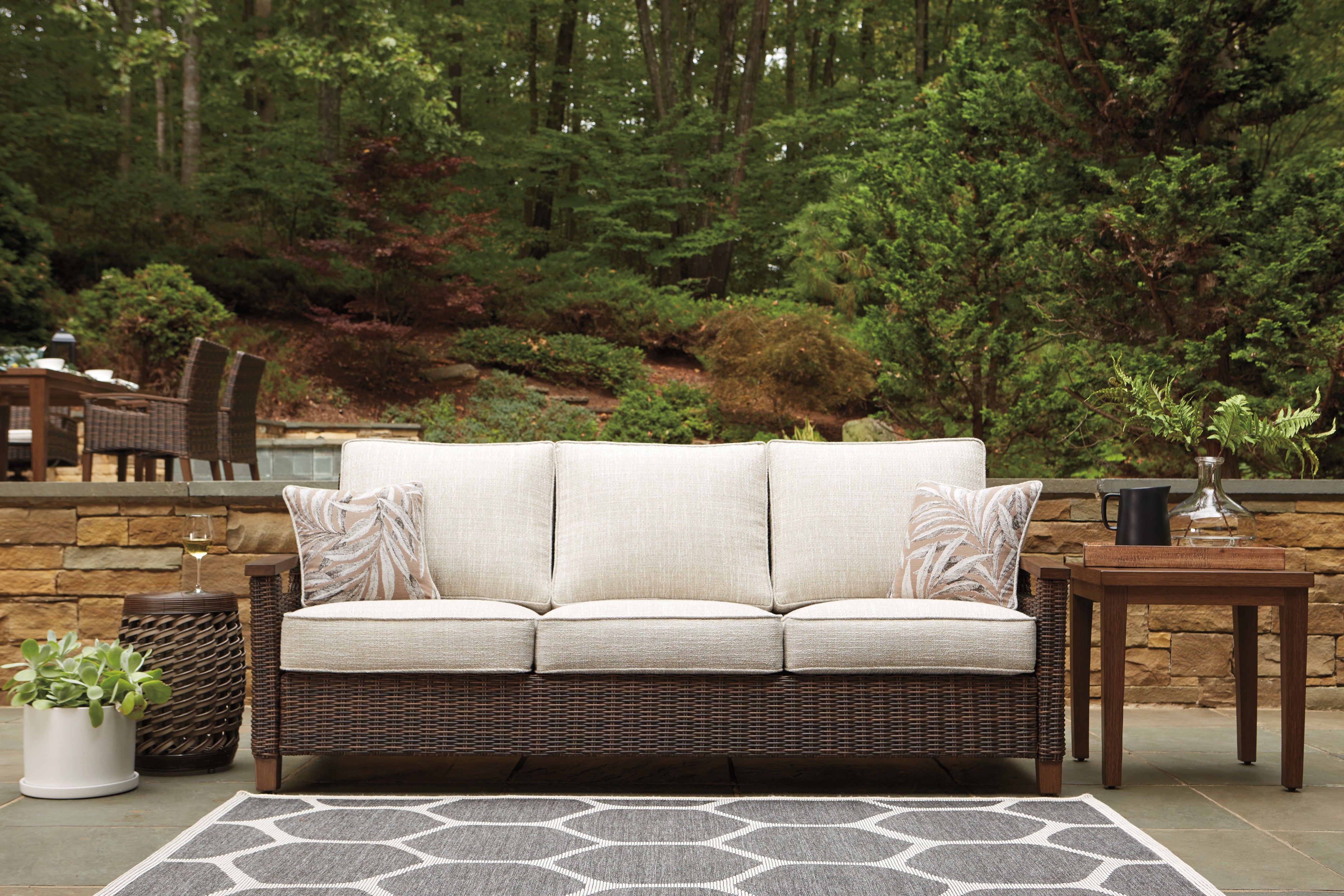 Furniture City Laplace - Ashley Furniture - Paradise Trail Outdoor - Sofa with Cushion / Medium Brown - P750-838