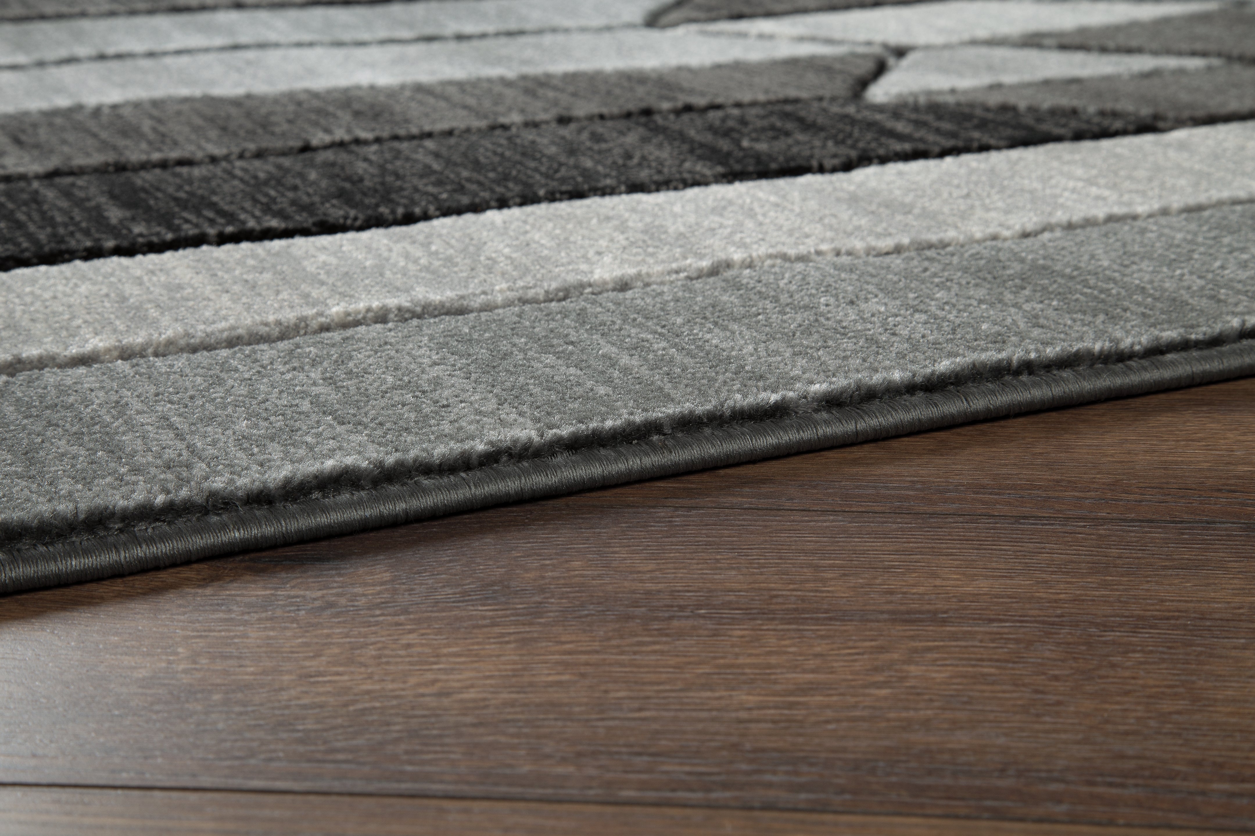 Furniture City Laplace - Ashley Furniture - Chayse Rug - 6'6" x 9'6" Rug / Black/Gray - R403461