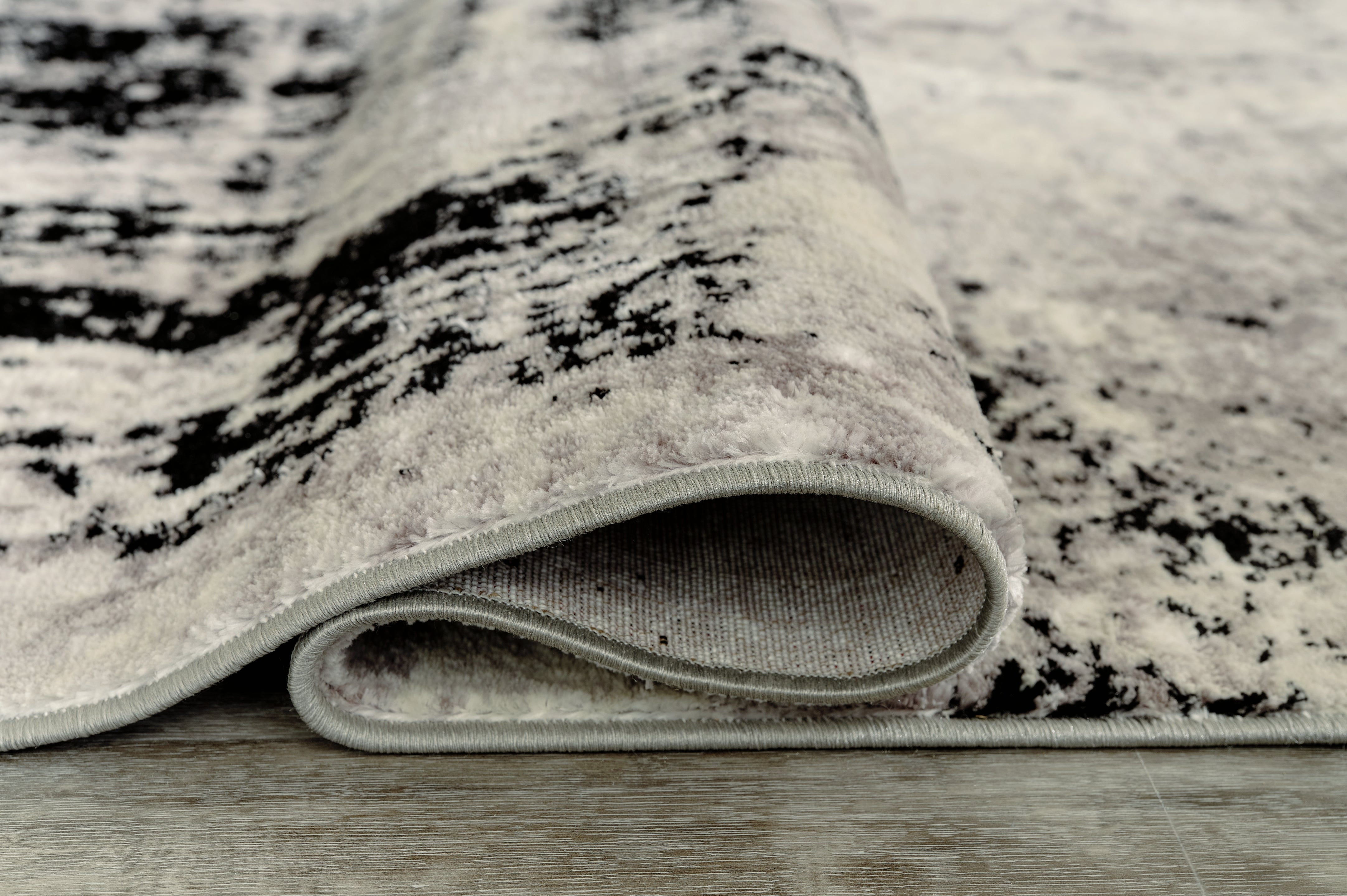 Furniture City Laplace - Ashley Furniture - Zekeman Rug - 7'10" x 10' Rug - R404921