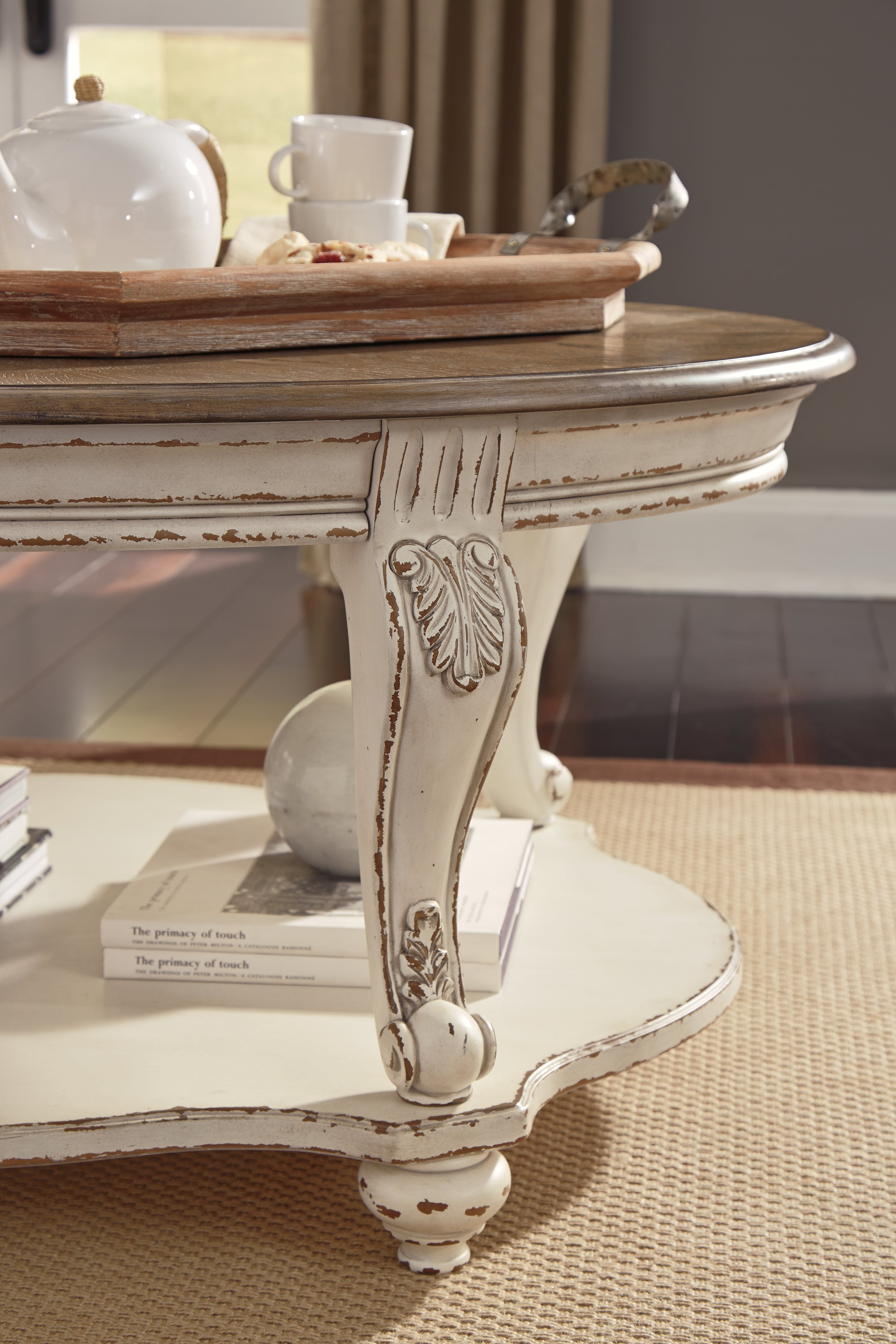Furniture City Laplace - Ashley Furniture - Realyn Coffee Table - Oval Cocktail Table / White/Brown - T743-0